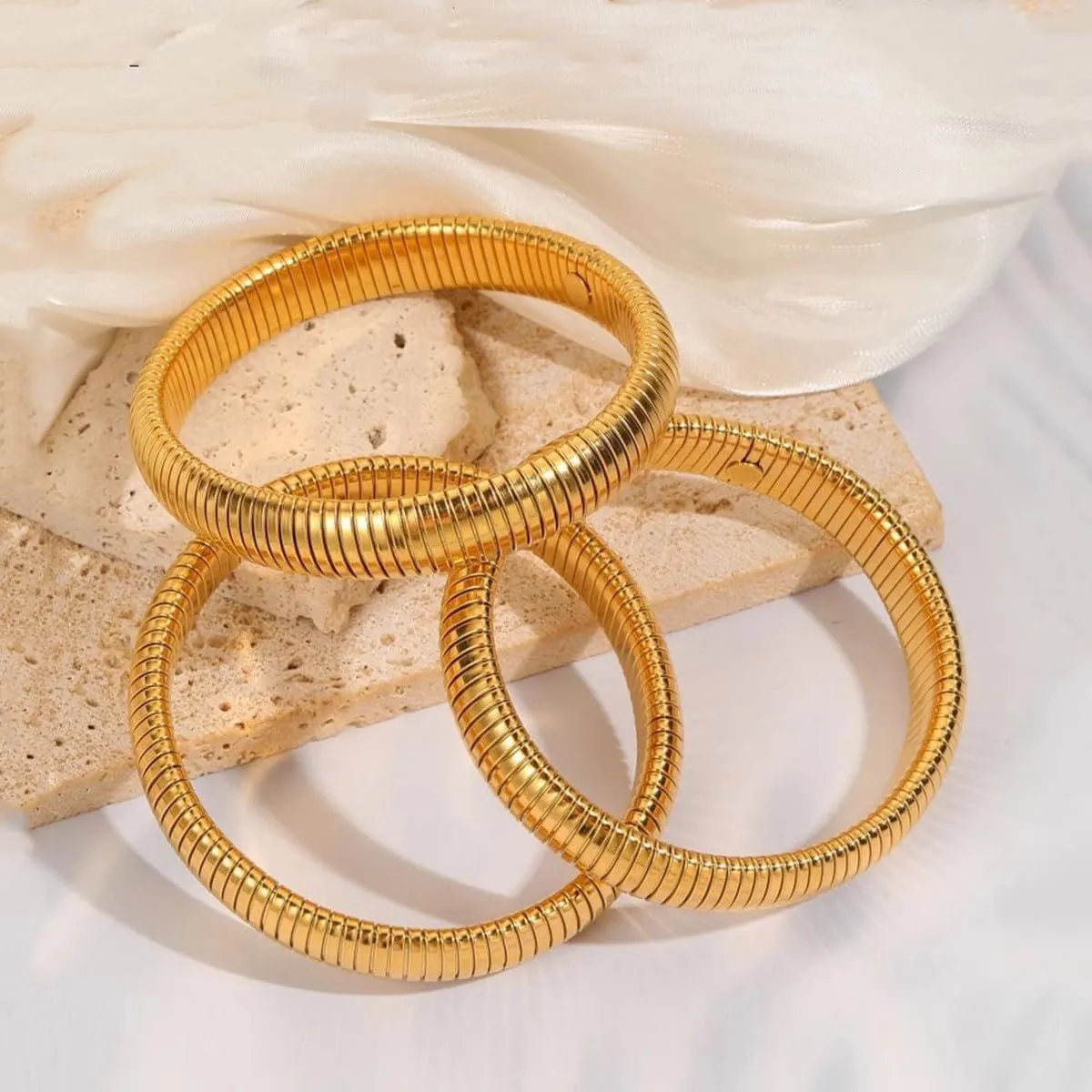Gold Bangles for Women Set of 3 Chunky Stretch Bangles Bracelets 24K Gold Plated Stainless Steel Bracelets Flexible Wide Stack Bracelets Designer Look Alike Jewelry for Women